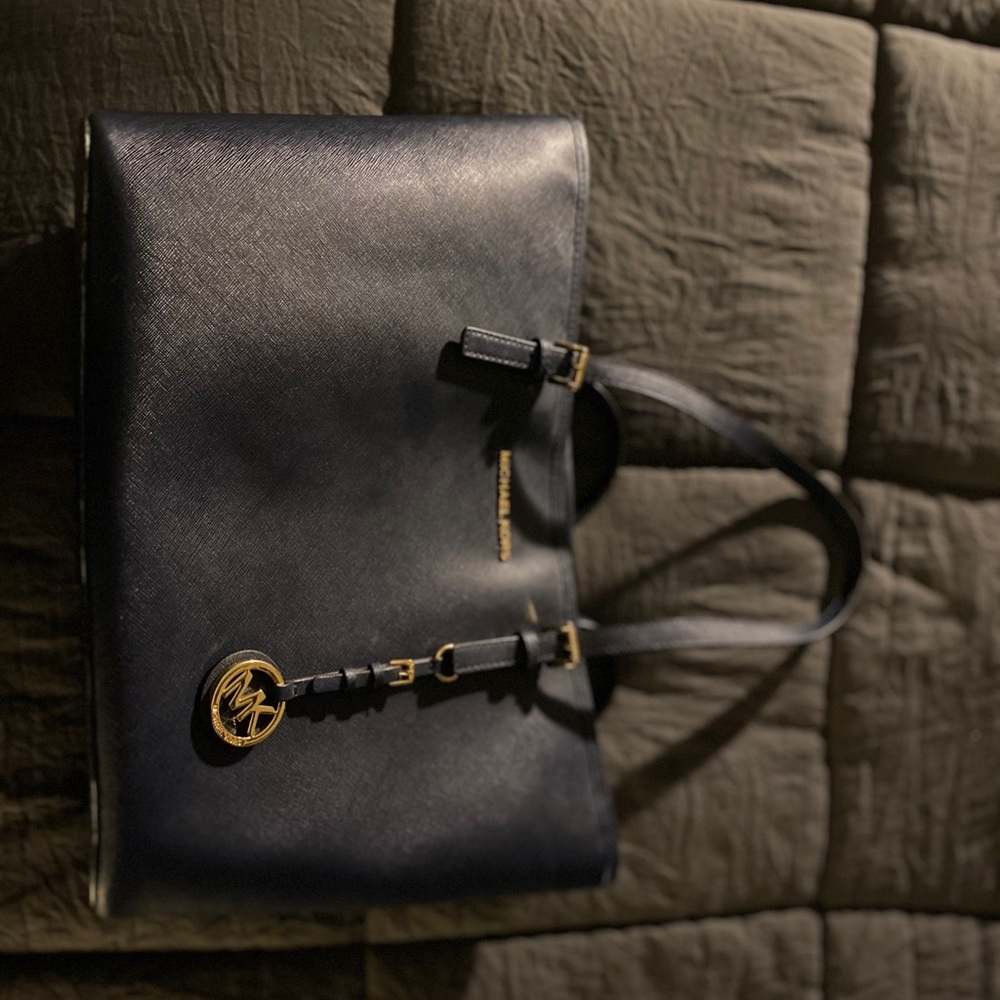 Navy blue and gold Michael Kors purse with wallet
